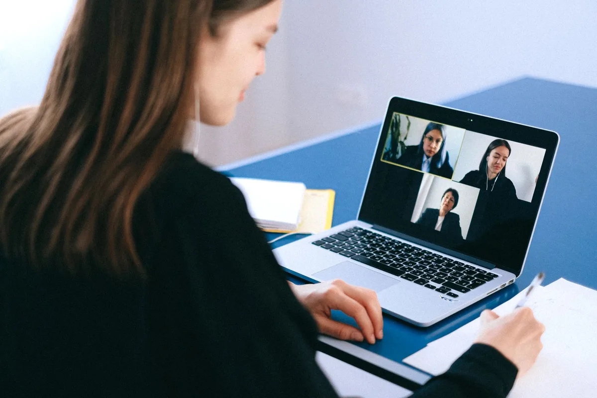 A distributed team on a video call - how India and US development teams actually work together on one project