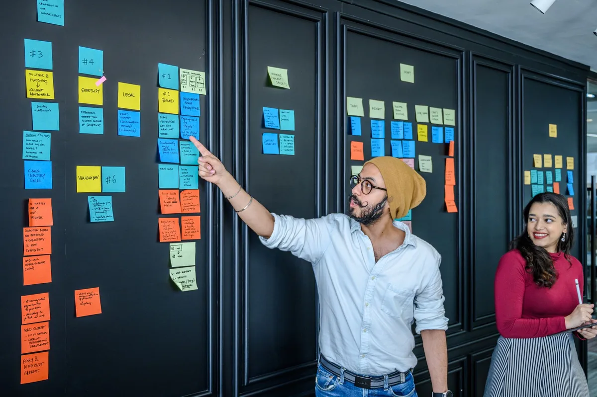 Project team mapping phases on a planning board - where realistic website timelines are set
