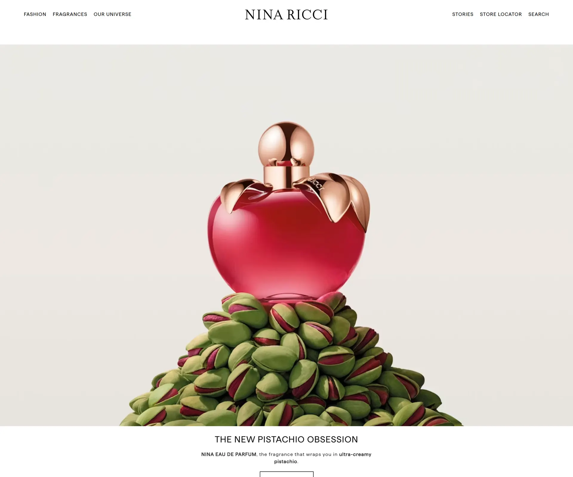 A Nina Ricci homepage module on desktop: the red apple-shaped Nina eau de parfum bottle resting on a mound of pistachios, titled The New Pistachio Obsession, beneath the Nina Ricci navigation