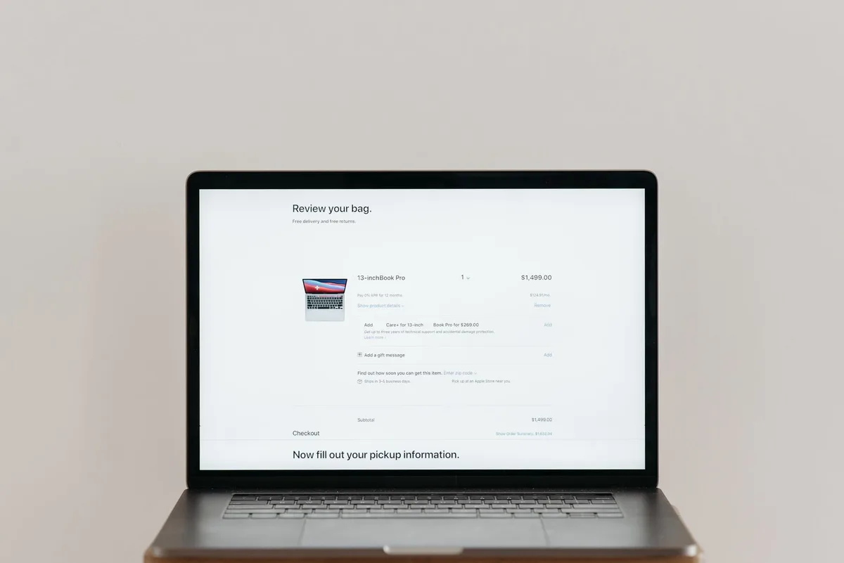 Reviewing an agency's portfolio on screen - live sites tell you more than any pitch deck
