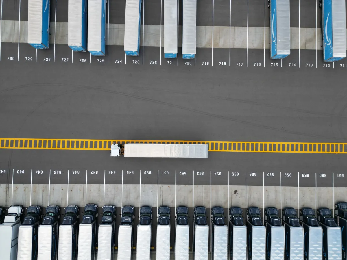Freight moving through a logistics hub - the operations a logistics website has to keep up with